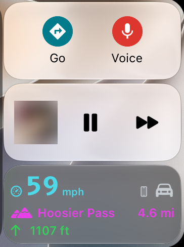 CarPlay Dashboard screenshot on the way to Hoosier Pass: the Low Pass tile shows 59 mph, Hoosier Pass 4.6 miles ahead and 1107 feet to climb, below the Go and Voice suggestions and a Now Playing card.